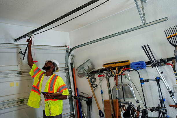 Professional Garage Door Panel Replacement technician working in Androscoggin County County, ME